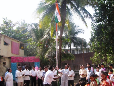 Mr. Prasad Mankar of HJS hoisting the National Flag Mr. Prasad Mankar of HJS hoisting the National Flag